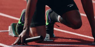 How To Run Faster In 100m Race athlete sprinting